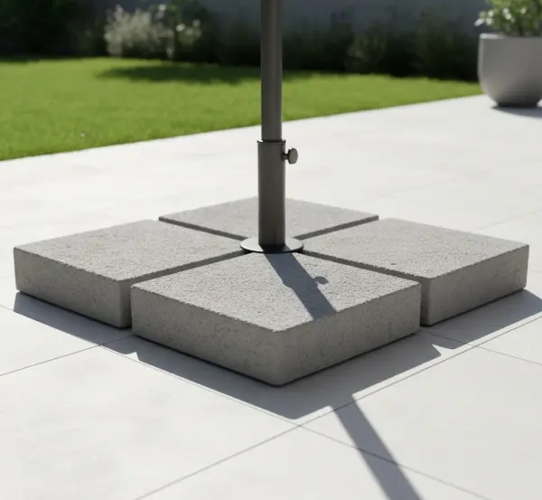 Jak obciążnik do parasola betonowy stabilizuje go przy wietrze?